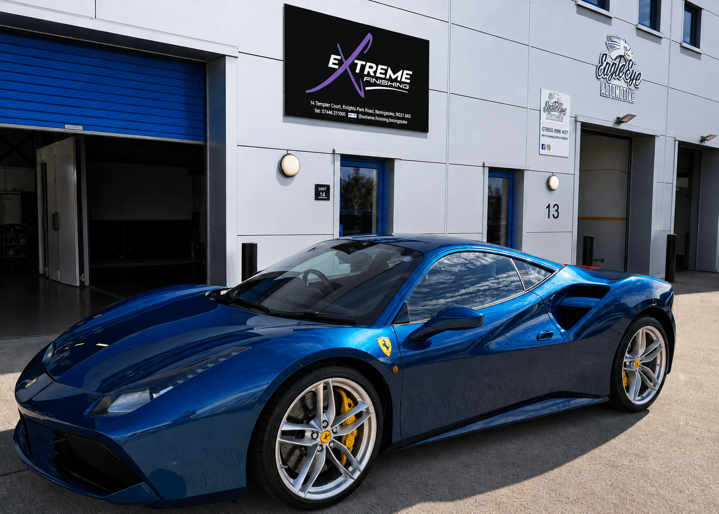 Blue Ferrari outside the Extreme Finishing workshop